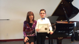 Matthew Foresi, winner of Richmond Music Festival, with one of the adjudicators