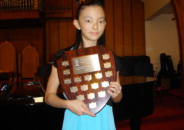 Claire Wen with BCRMTA Highest Mark Trophy for her Grade 10 RCM Piano Exam 